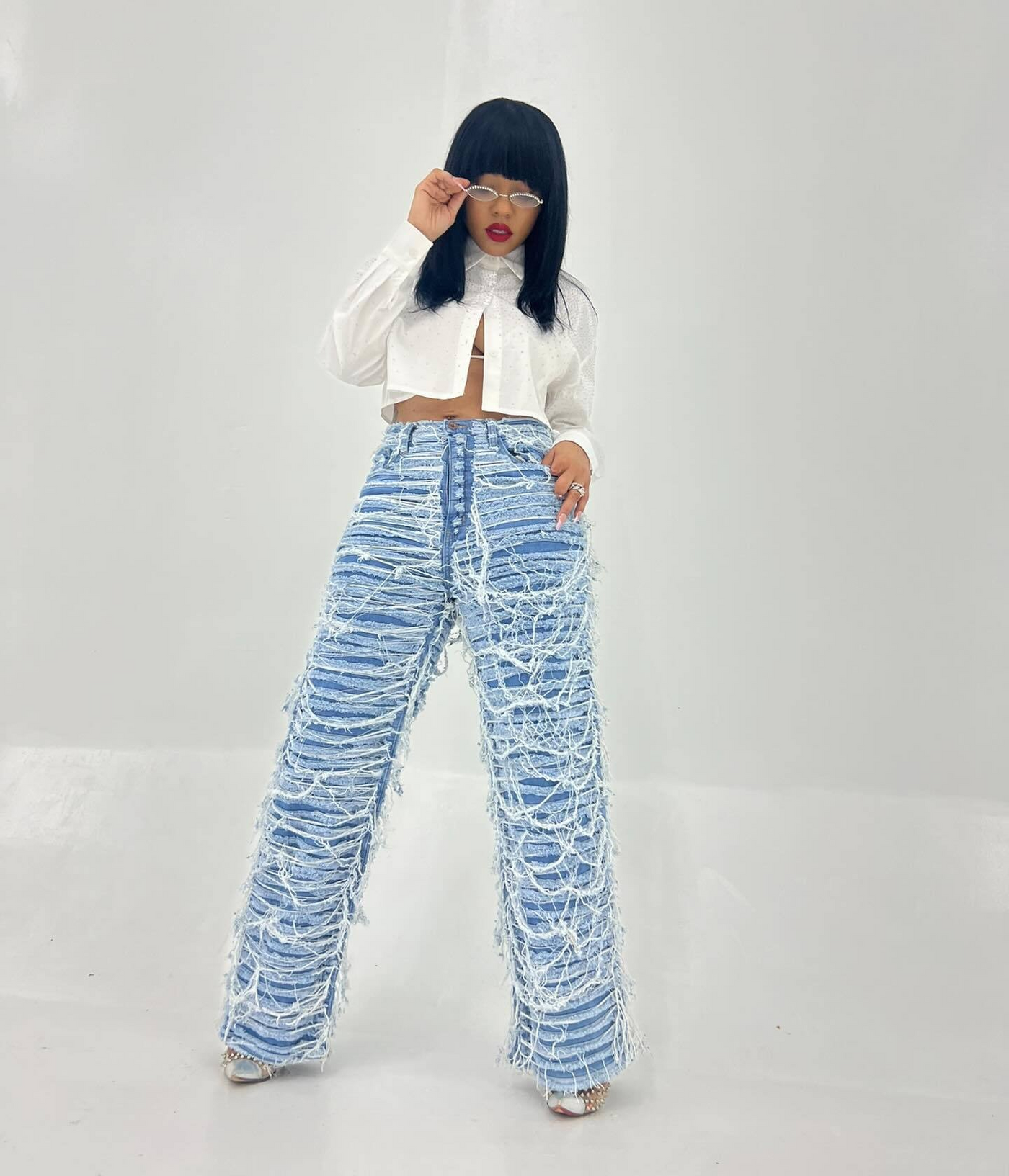 25 Edition – Women’s High Waist Ripped Tassel Denim Pants