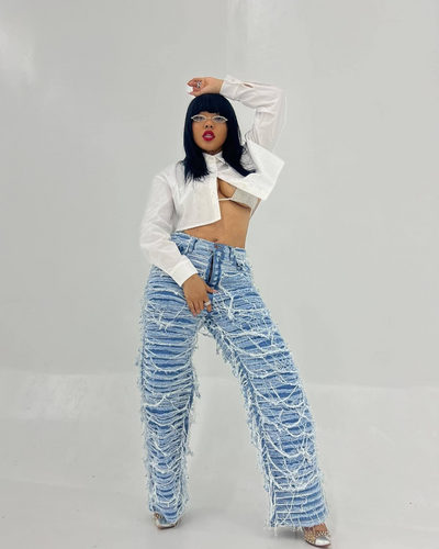 25 Edition – Women’s High Waist Ripped Tassel Denim Pants